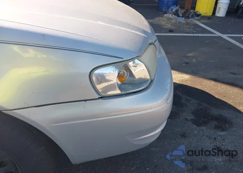 1999 Toyota Corolla Ce/Le из США, поврежденный, VIN 2T1BR12E2XC747502